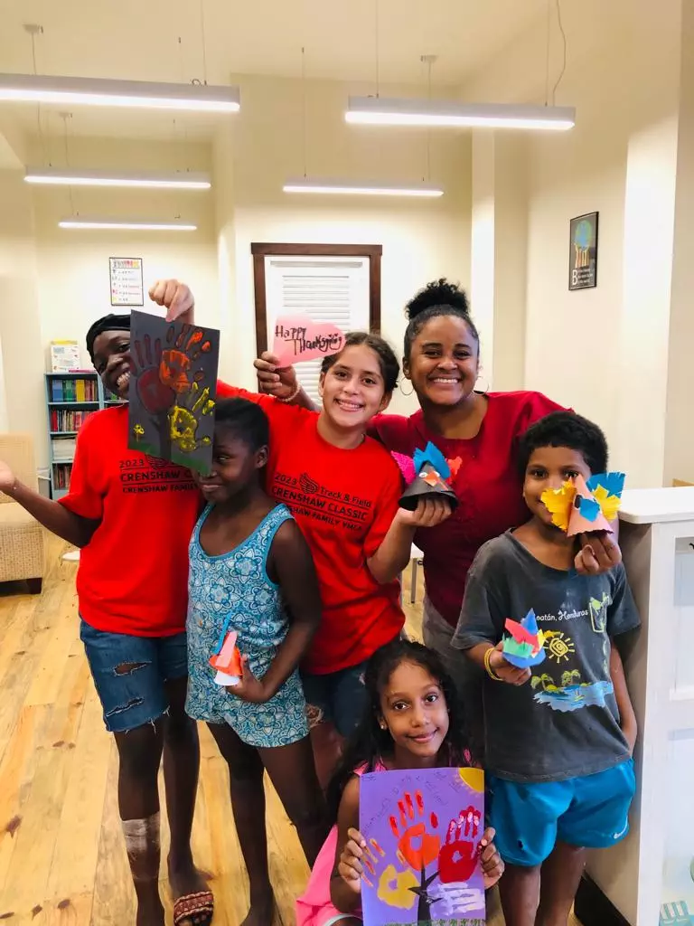 Los Suenos students smiling in library